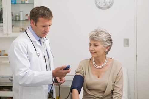 a photo of a doctor with an elderly woman