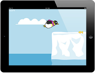 an ipad with an app showing a penguin jumping on an iceberg